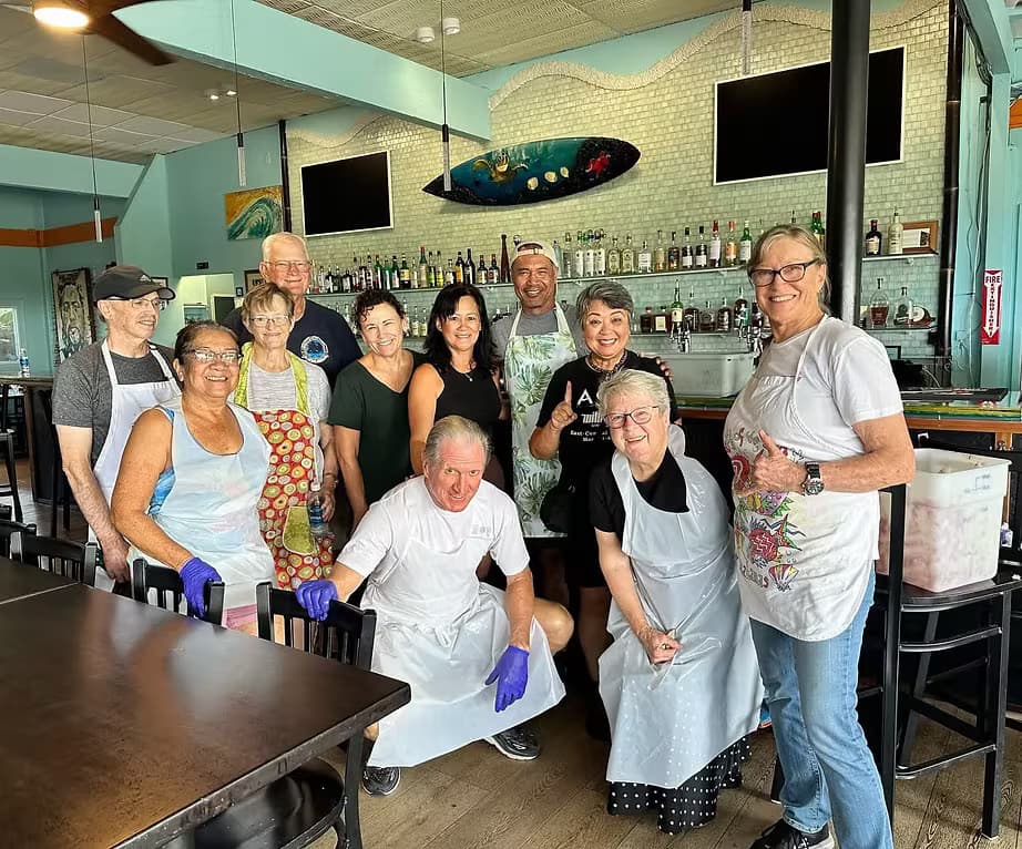 Volunteers prepping Thanksgiving meals at Jackie Rey's Kona